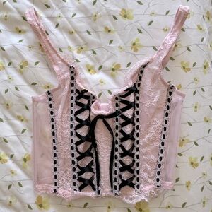 Victoria’s Secret pale pink bustier with black accents size xs